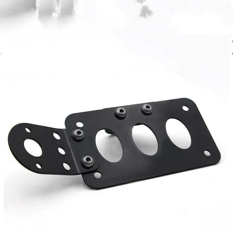 Black aluminium motorcycle side direction taillight and 7 x 4 inch licence plate bracket with seven-fin 12V light.