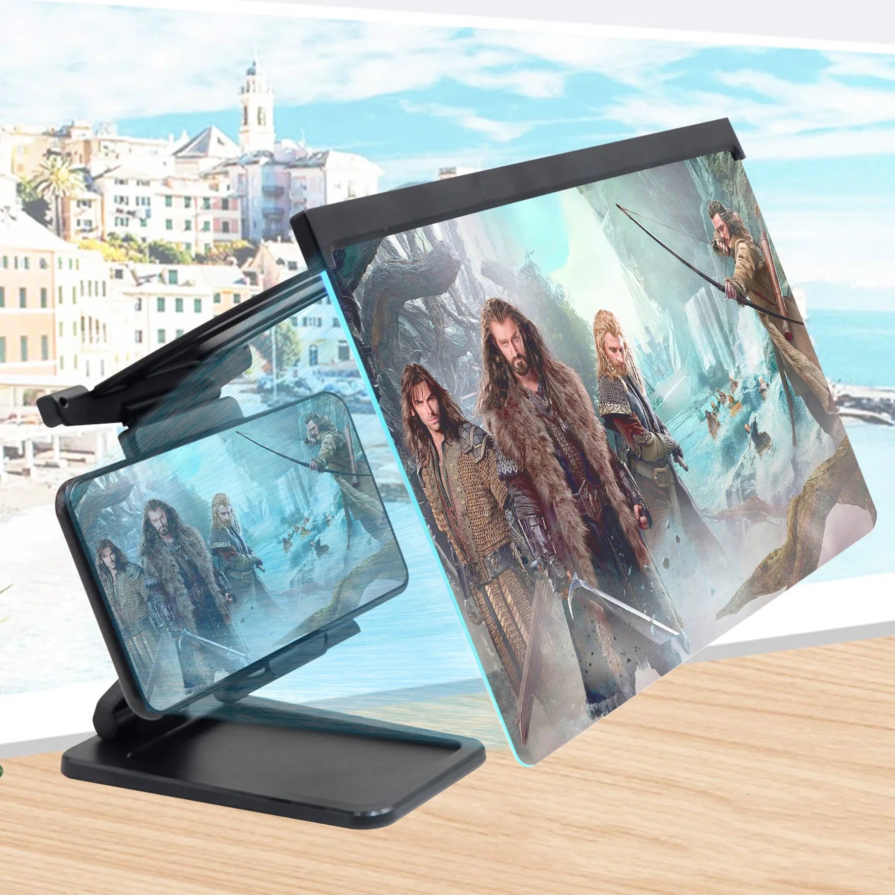 Black L20 smartphone screen magnifier with acrylic lens and separate plastic mounting bracket on a table.