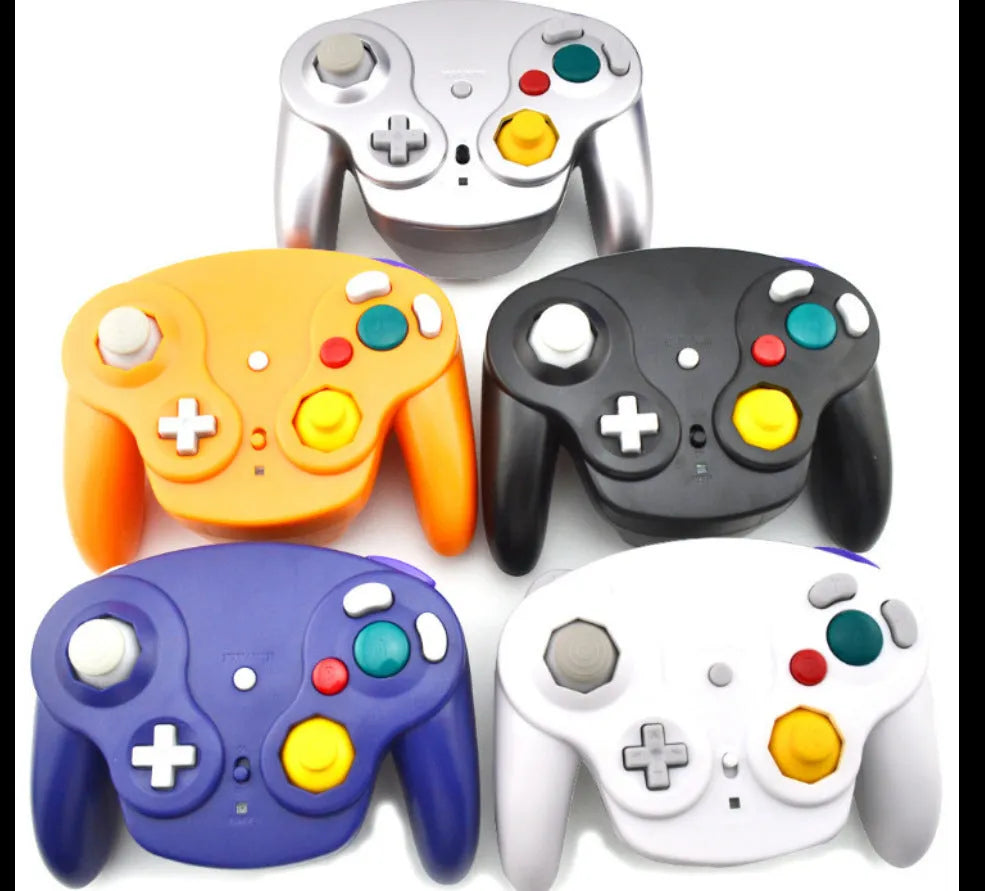 NGC wireless game controller in multiple colours on a grey background, showing its compact size and button layout.