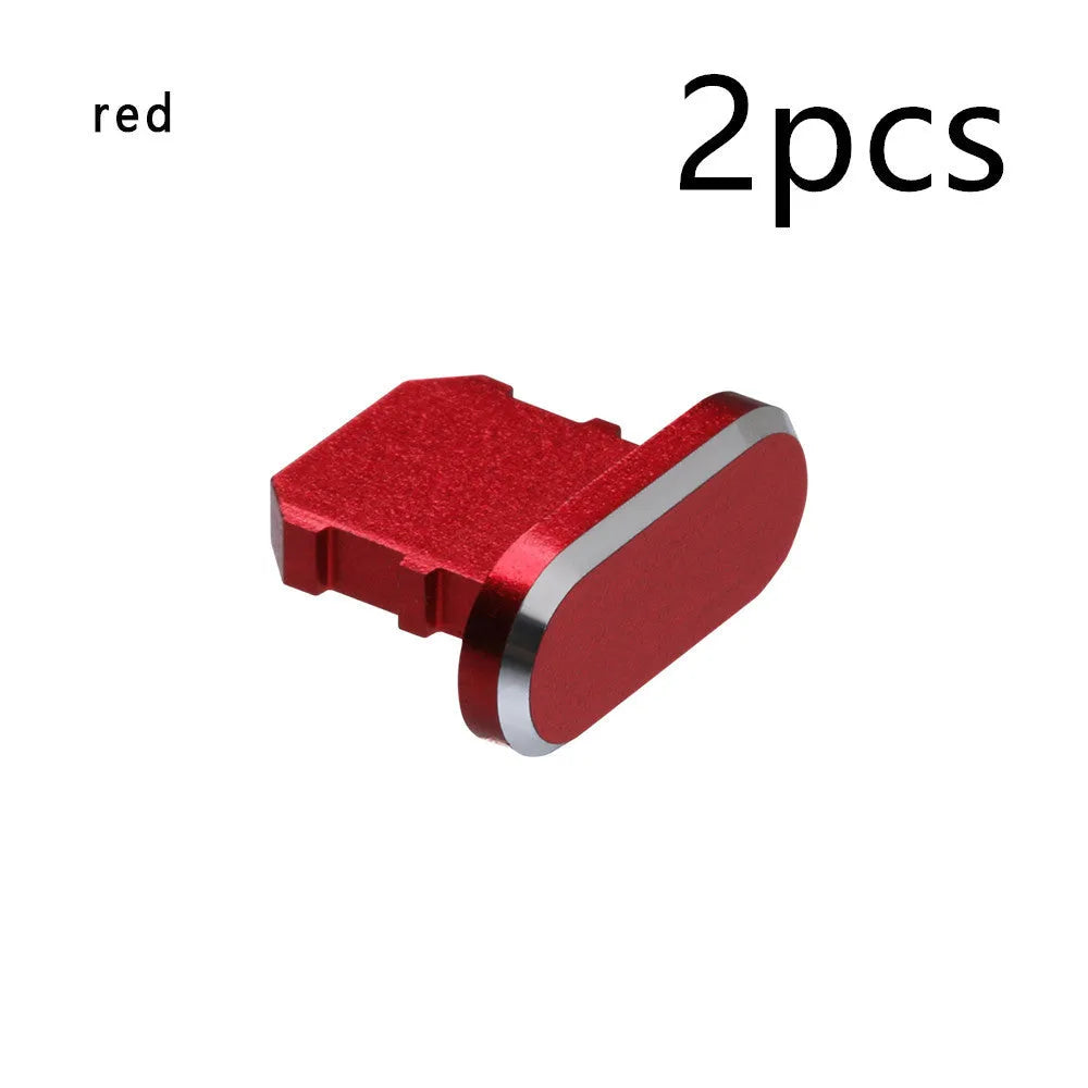 Aluminium alloy iPhone charging port dust plug in multiple colours including gold, silver, blue, red, grey, black, and rose gold.