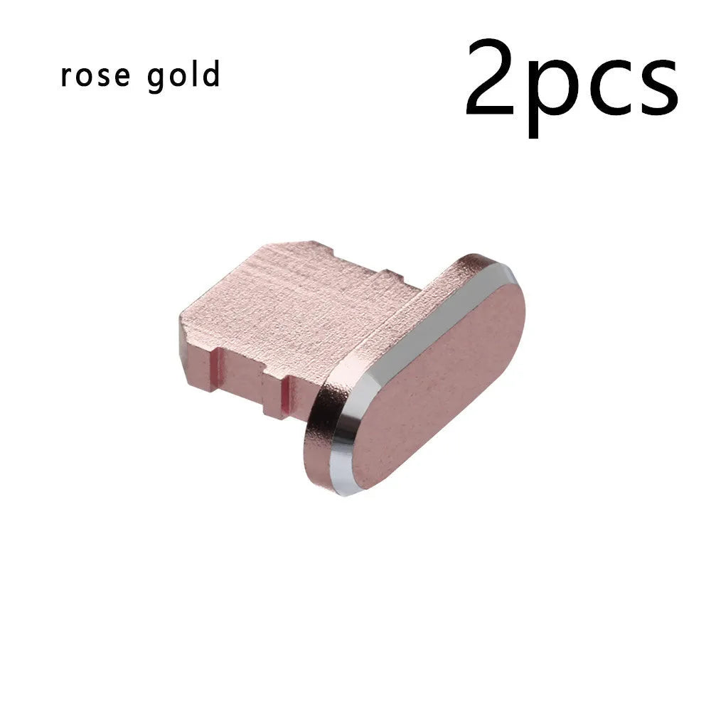 Aluminium alloy iPhone charging port dust plug in multiple colours including gold, silver, blue, red, grey, black, and rose gold.