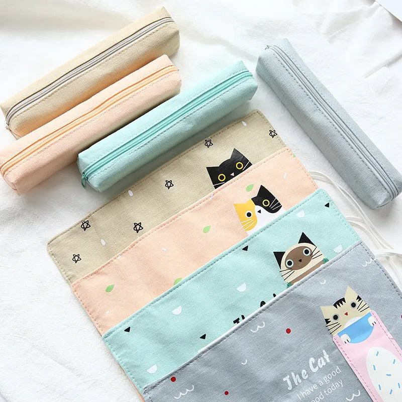 Rolling pencil case with cartoon cat pattern in blue, green, pink, yellow colours for school and office stationery storage