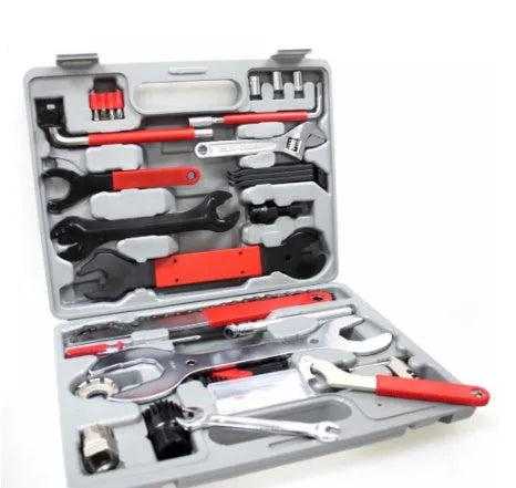 Red compact bicycle repair tool set in PE case with carbon steel tools on white background