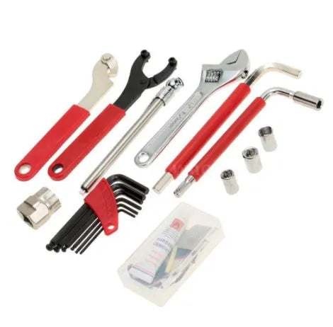 Red compact bicycle repair tool set in PE case with carbon steel tools on white background