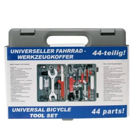 Red compact bicycle repair tool set in PE case with carbon steel tools on white background
