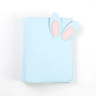 Cute bunny style mini photo album in pink, blue, or white, showing 3-inch size and loose-leaf pages.