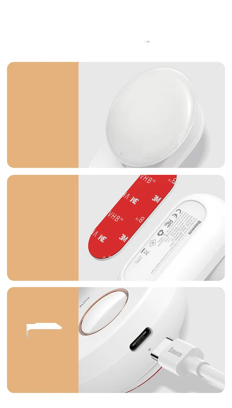White Baseus rechargeable night light with motion sensor on a wooden bedside table.