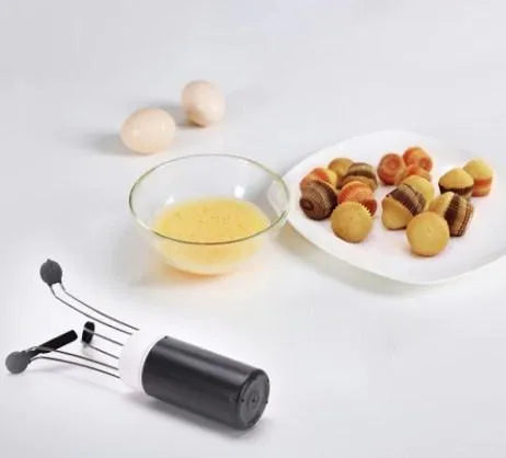 White and black wireless automatic blender with stainless steel stirring arms on kitchen counter