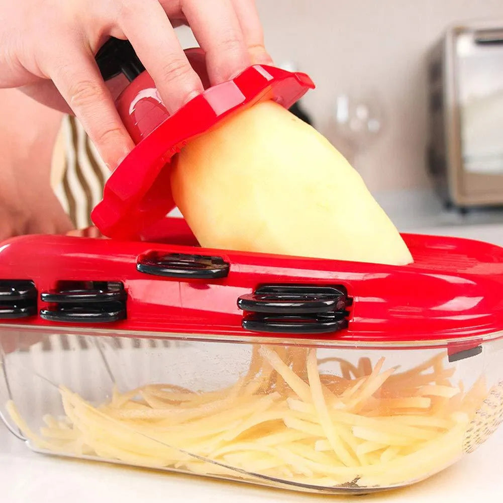 Red multi-function vegetable cutter with 7 stainless steel blades and hand guard