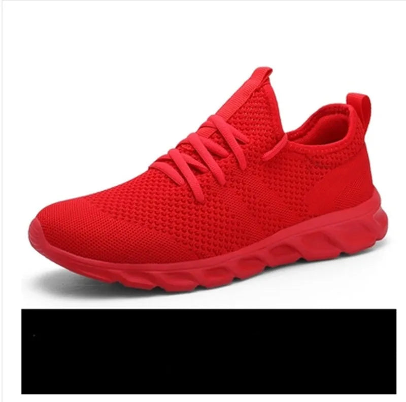Men's black and white breathable mesh sneakers with round toe and lace-up design for casual sport.