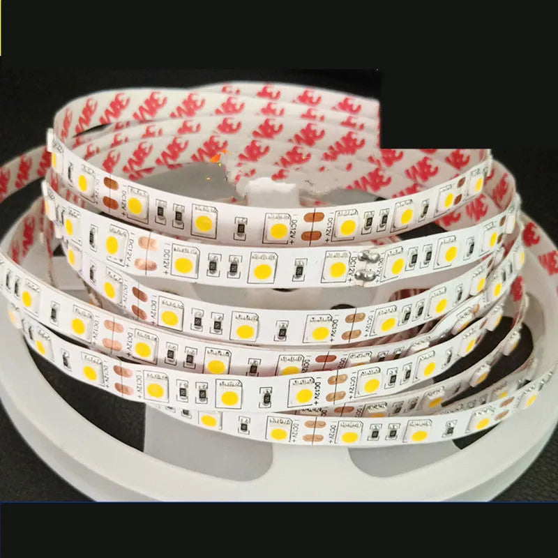Close-up of white 12V LED strip light showing either 60 or 120 LEDs per metre for shelf and counter installation.