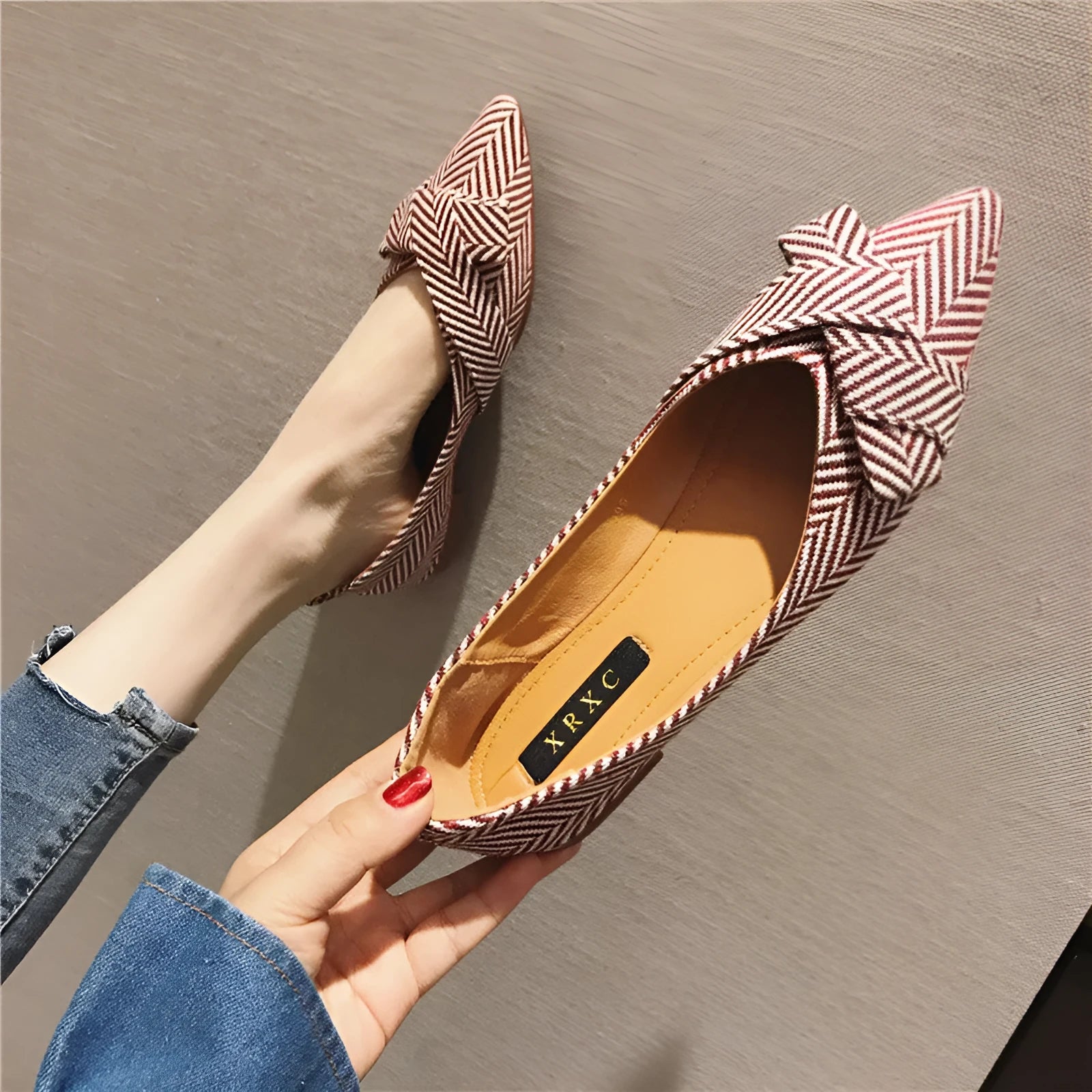 Women's pointed toe shallow mouth flats in black and red, low flat heel, cotton upper.