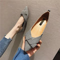 Women's pointed toe shallow mouth flats in black and red, low flat heel, cotton upper.