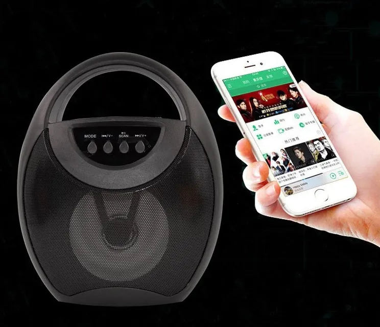 Portable Bluetooth speaker in black plastic casing with USB port and control buttons