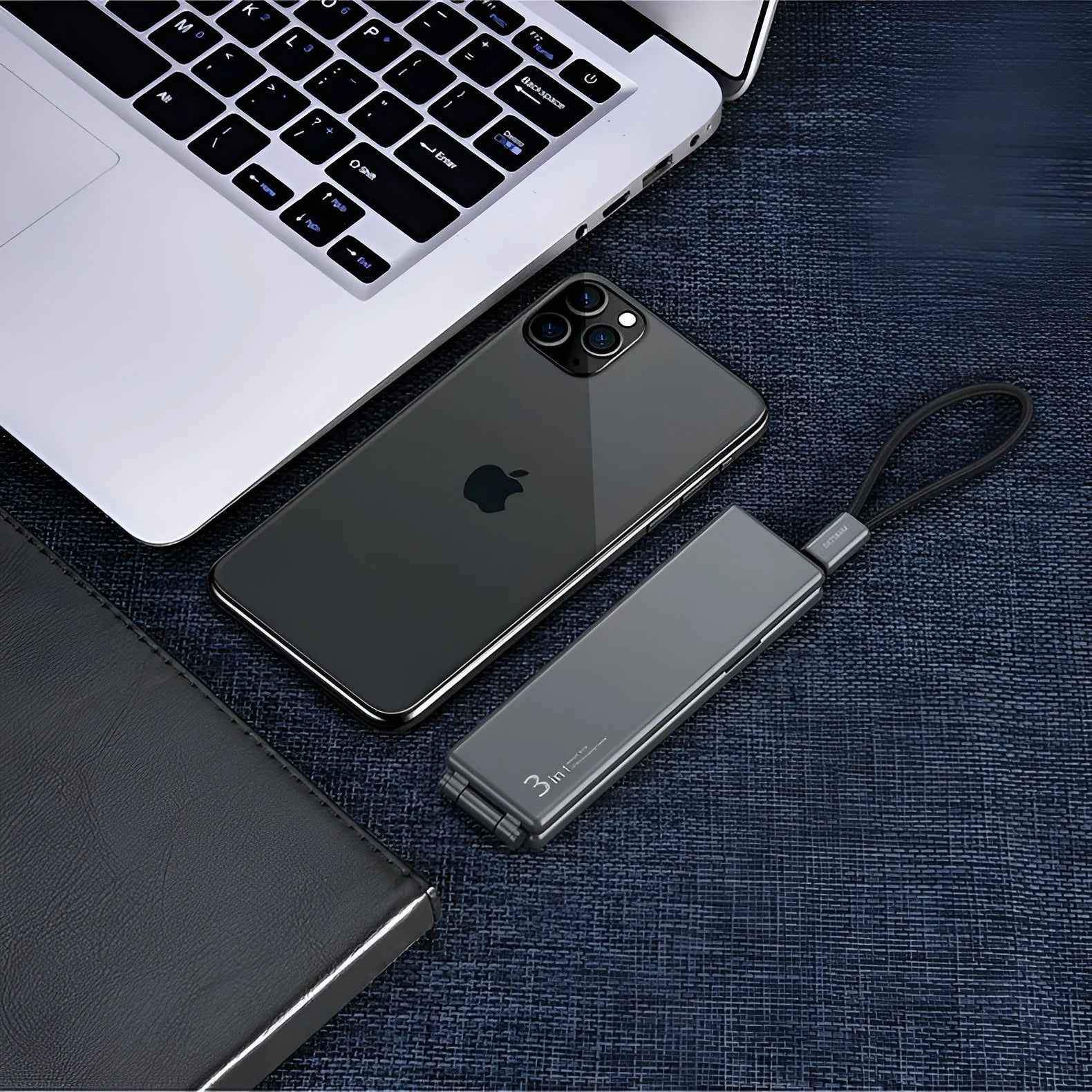 Portable three-way charger showing iPhone, Type-C and Micro USB interfaces in compact black design