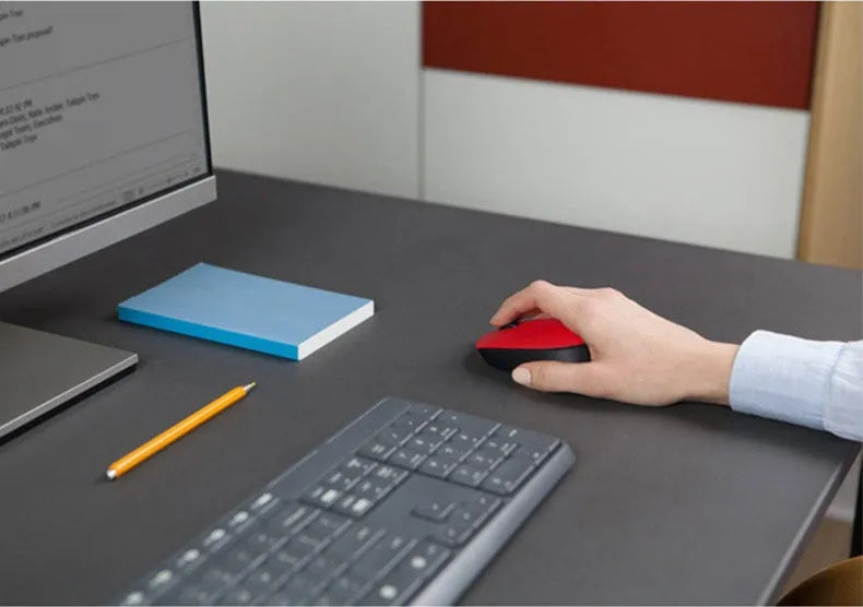 Small portable wireless mouse in red, blue, and grey with USB receiver