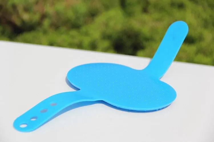 Oval rubber pet bath brush for hand massage and dog grooming in red