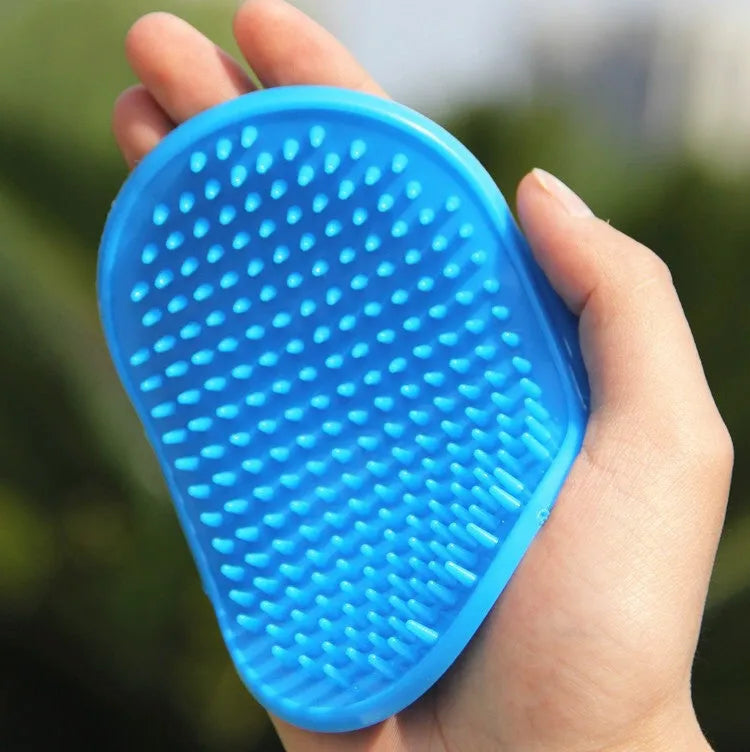 Oval rubber pet bath brush for hand massage and dog grooming in red