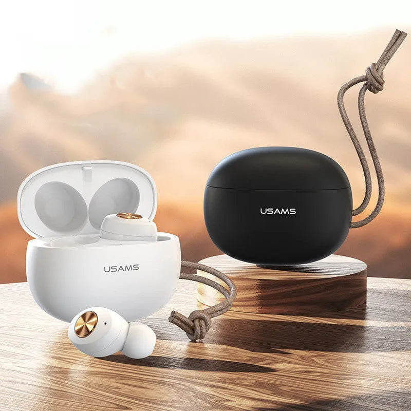 Wireless Bluetooth mini TWS earbuds in black, white, and dark green with their compact rectangular charging case.