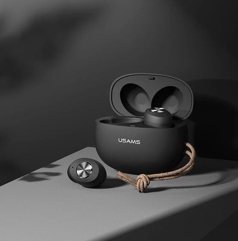 Wireless Bluetooth mini TWS earbuds in black, white, and dark green with their compact rectangular charging case.
