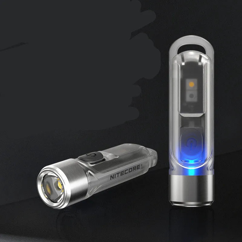 Green Nitecore TIKI USB rechargeable portable light with keychain, showing three light sources