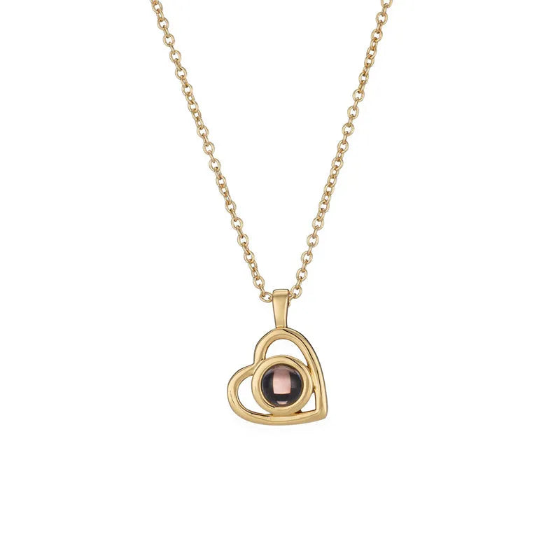 925 silver heart shaped pendant with custom photo projection feature on white background