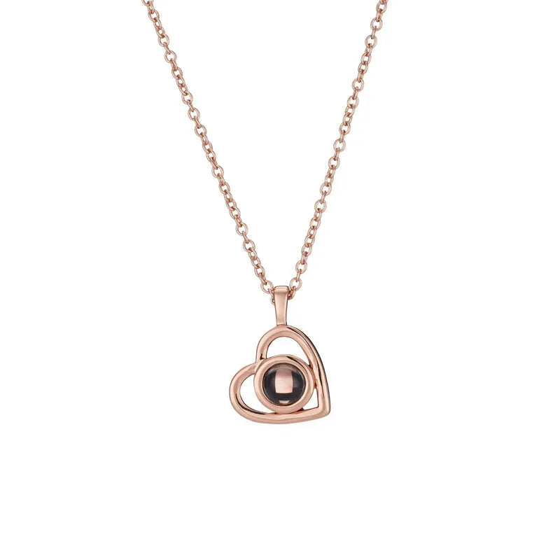 925 silver heart shaped pendant with custom photo projection feature on white background