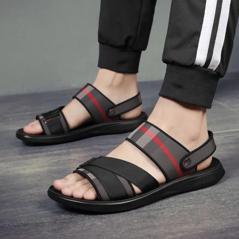 Youth leisure sports sandals with a blue Lycra upper and grey polyurethane sole.