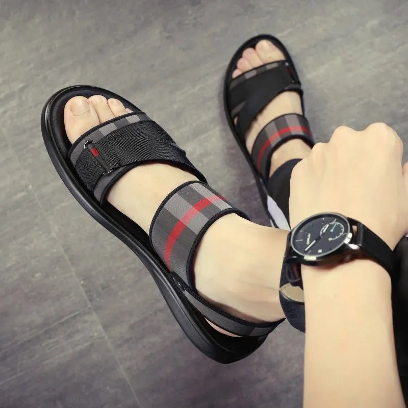 Youth leisure sports sandals with blue Lycra upper and polyurethane sole on a white background.