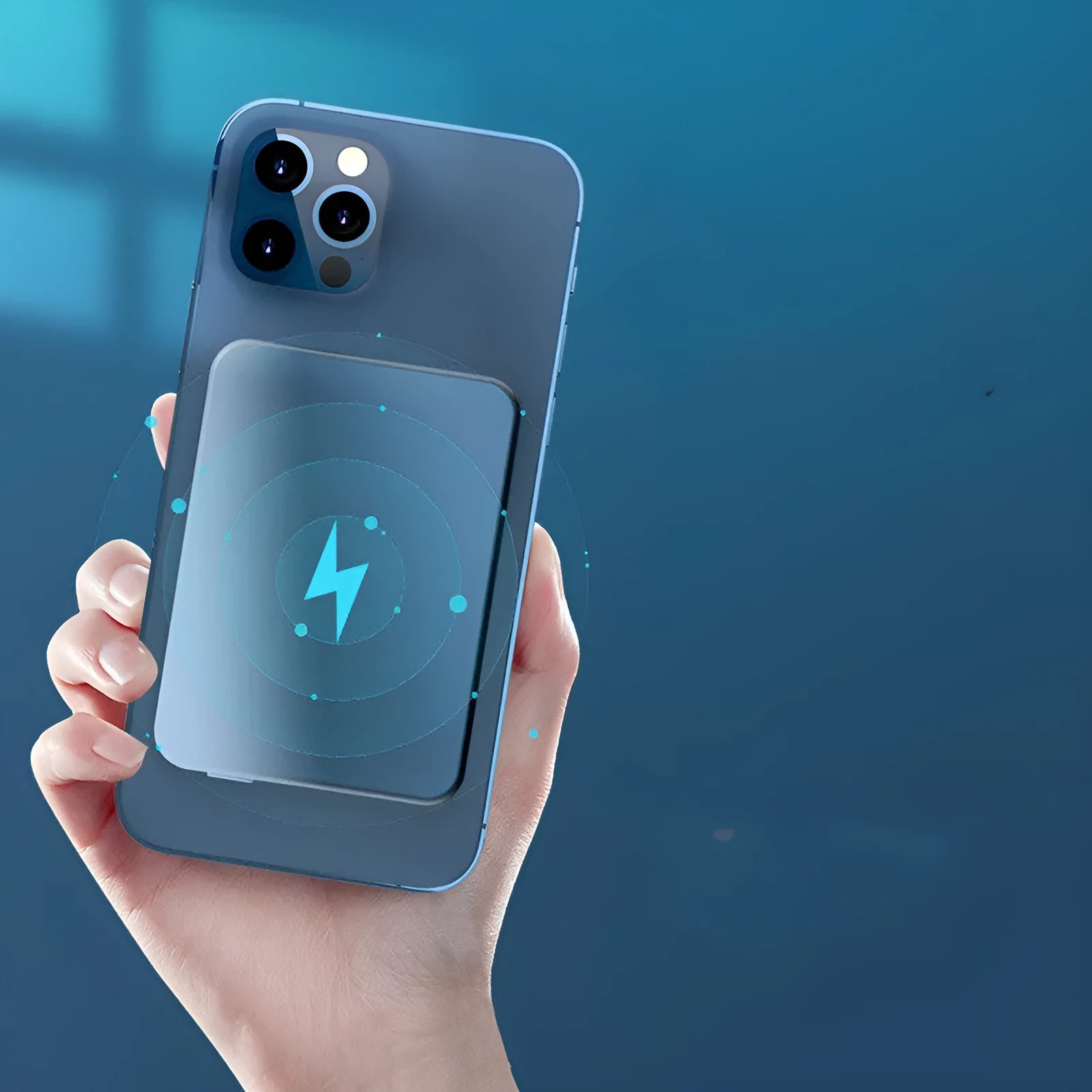 Silver aluminium magnetic wireless charging power bank, shown next to a mobile phone, displaying slim 12mm profile.