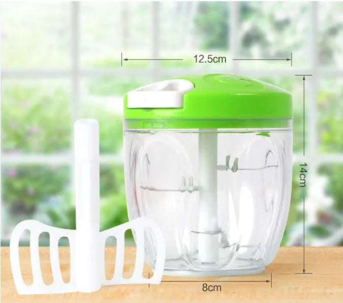 Green manual food chopper with stainless steel blades, showing 500ml capacity bowl.