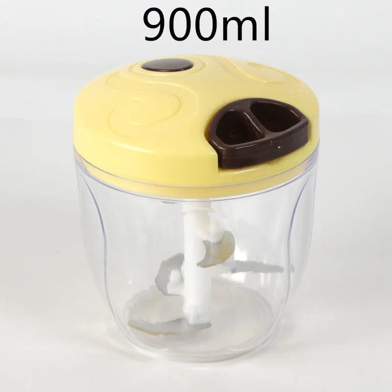 Green manual food chopper with stainless steel blades, showing 500ml capacity bowl.