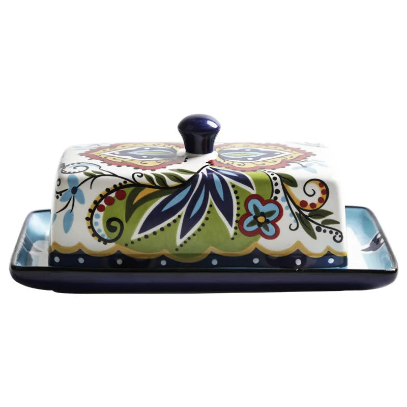 Square ceramic butter box with floral pattern and lid, shown in blue colour.