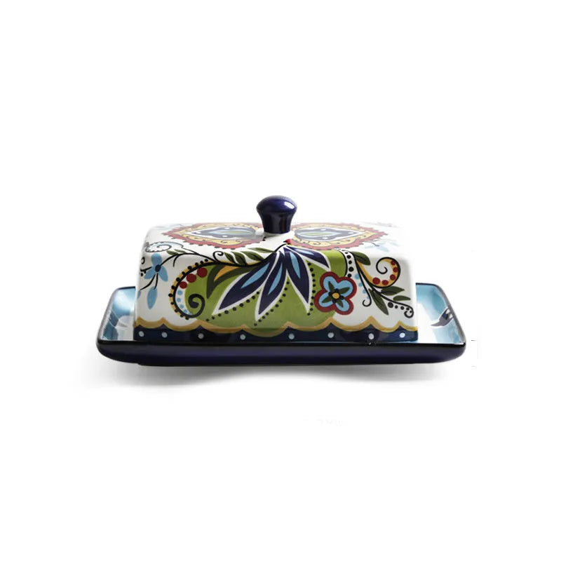 Square ceramic butter box with floral pattern and lid, shown in blue colour.