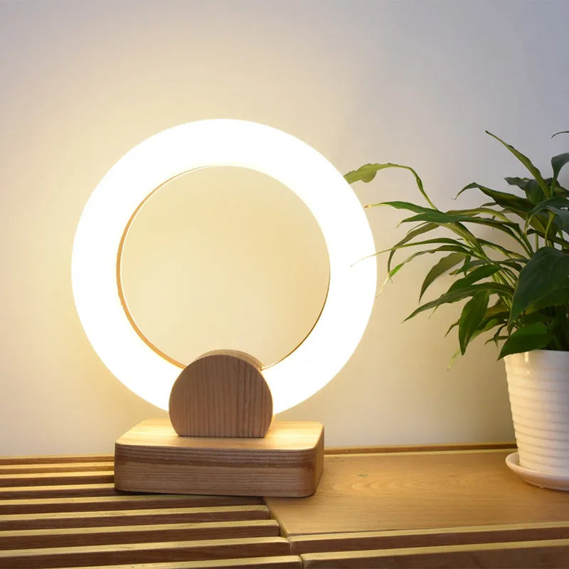 Modern wooden circular chandelier with acrylic shade in a Nordic style