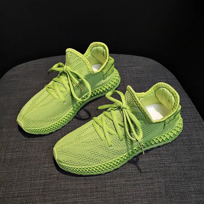 Women's breathable mesh casual sneakers in yellow with white sole, lace-up front, round toe, flat heel