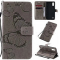 Xiaomi Butterfly wallet case in a choice of eight colours showing phone protection and card slot.