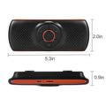 Orange plastic Bluetooth car hands-free speaker designed for sun visor mounting
