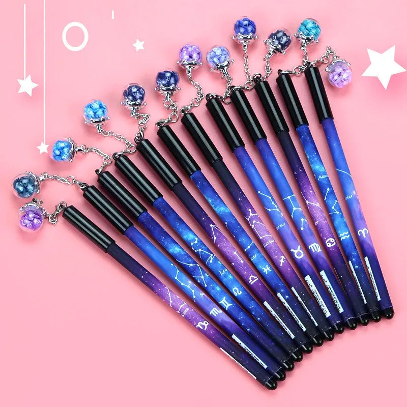 Pack of twelve gel pens with constellation designs on barrels, showing 0.5mm needle tips.