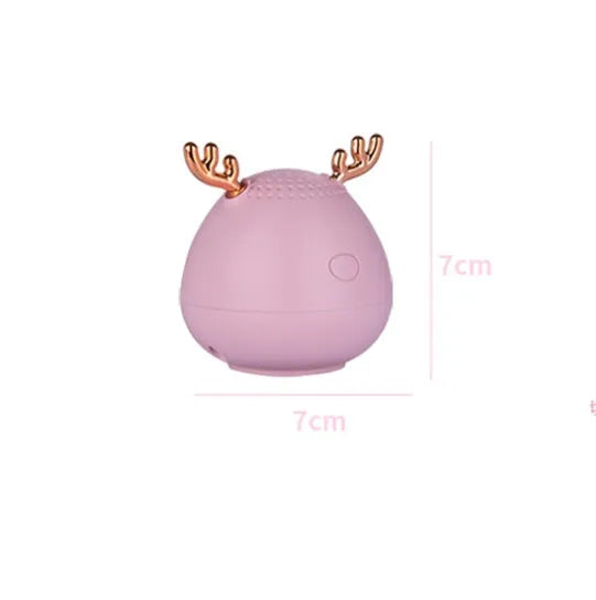 Compact portable Bluetooth speaker with white finish showing 75mm diameter dimensions