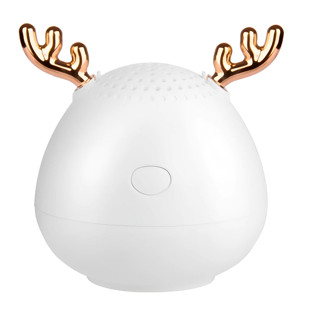 Compact portable Bluetooth speaker in green, pink, or white with USB charging cable