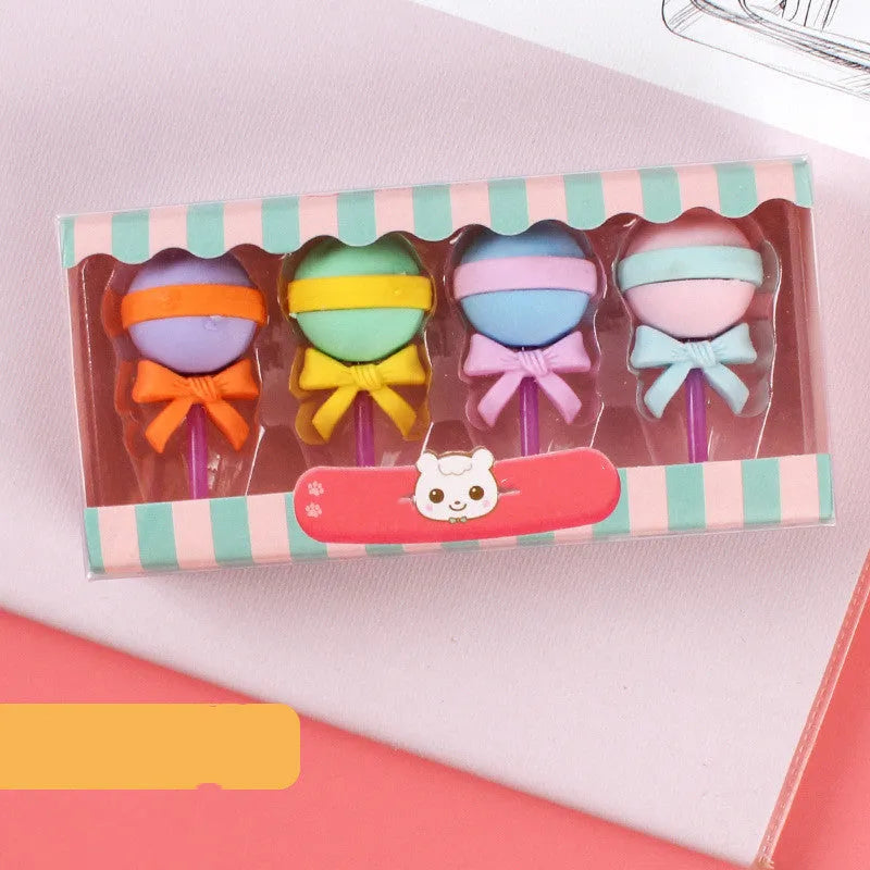 Set of 12 colourful cartoon food erasers including ice cream cones, donuts, and lollipops for children