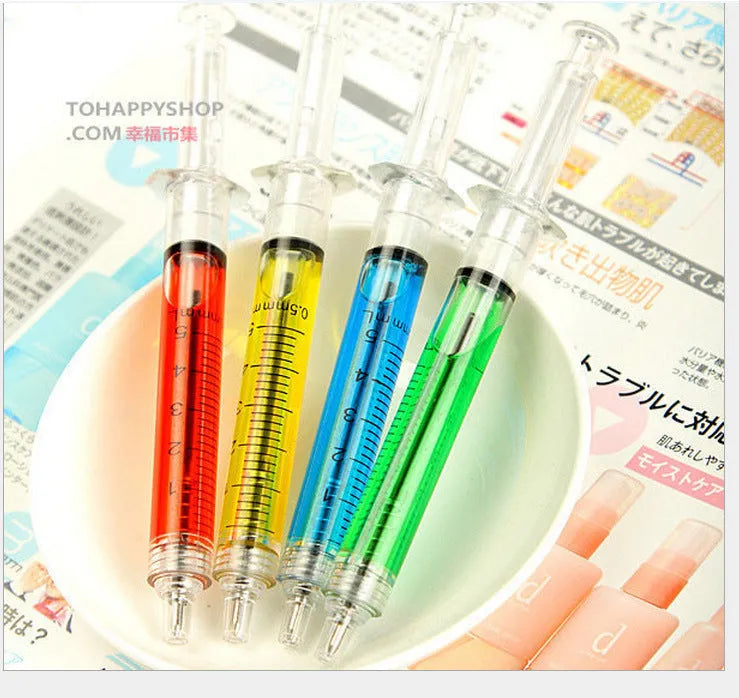 Syringe ballpoint pen in blue colour option with push mechanism and plastic body