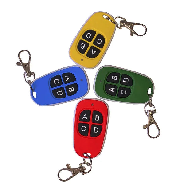 Four-button wireless remote control 56x32x11mm with red, yellow, green, and blue colour options