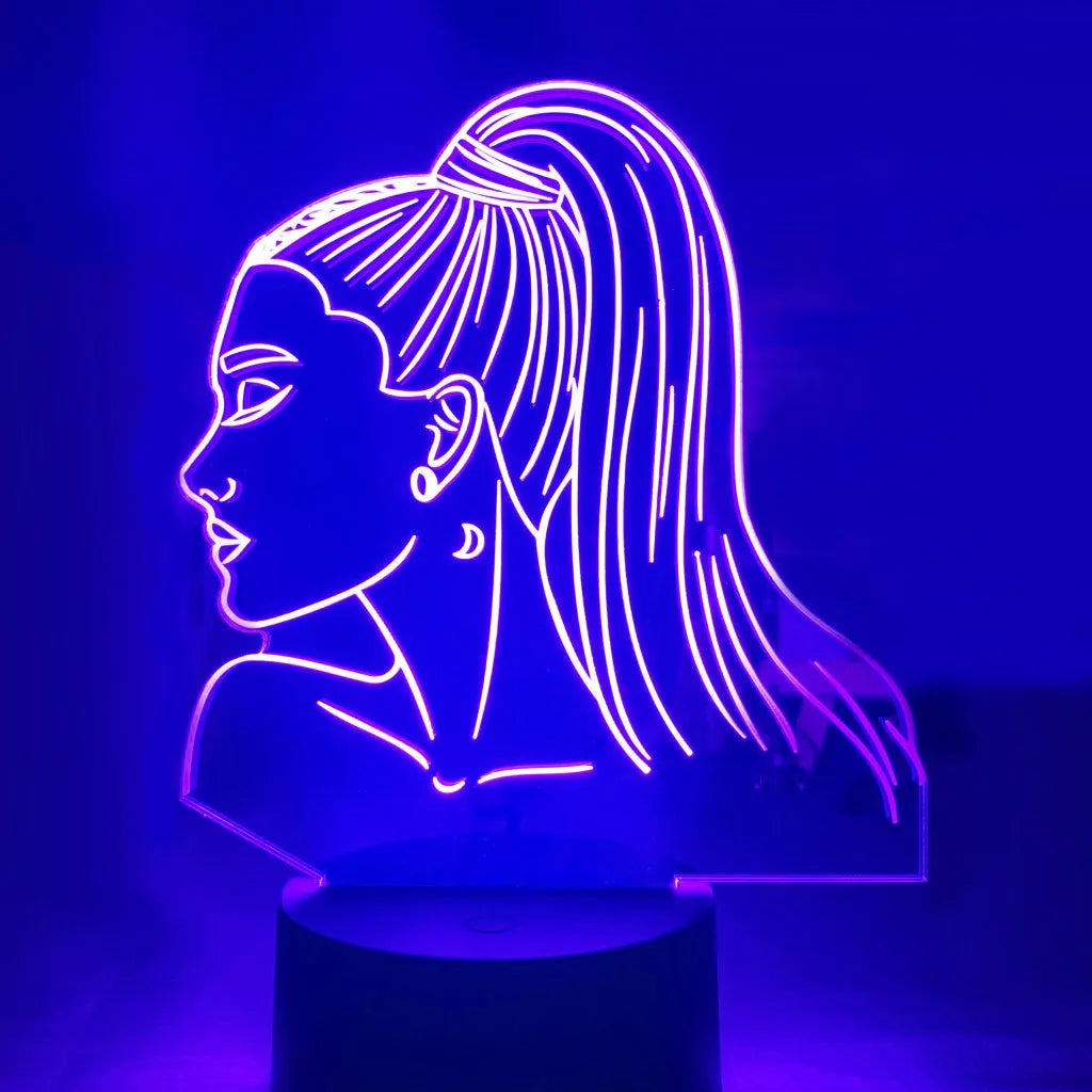 Black-based touch remote control LED desk lamp with acrylic shade on a nightstand.