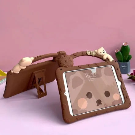 Brown cartoon-pattern silicone flat shell case for iPad tablets on a wooden table