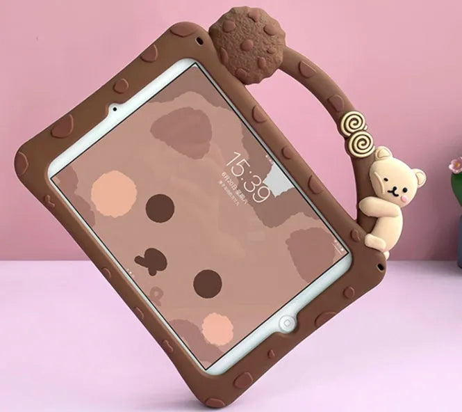 Brown cartoon-pattern silicone flat shell case for iPad tablets on a wooden table