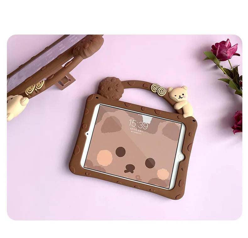 Brown cartoon-pattern silicone flat shell case for iPad tablets on a wooden table