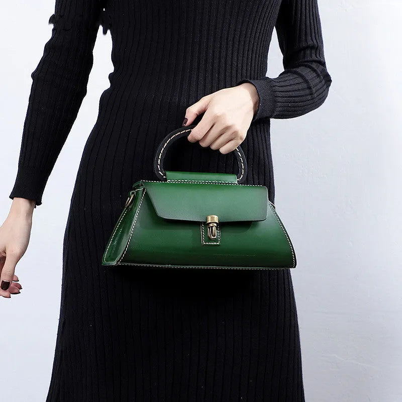 Women's genuine leather handbag with first layer cowhide, plain design, single strap, in yellow-brown, green or red.