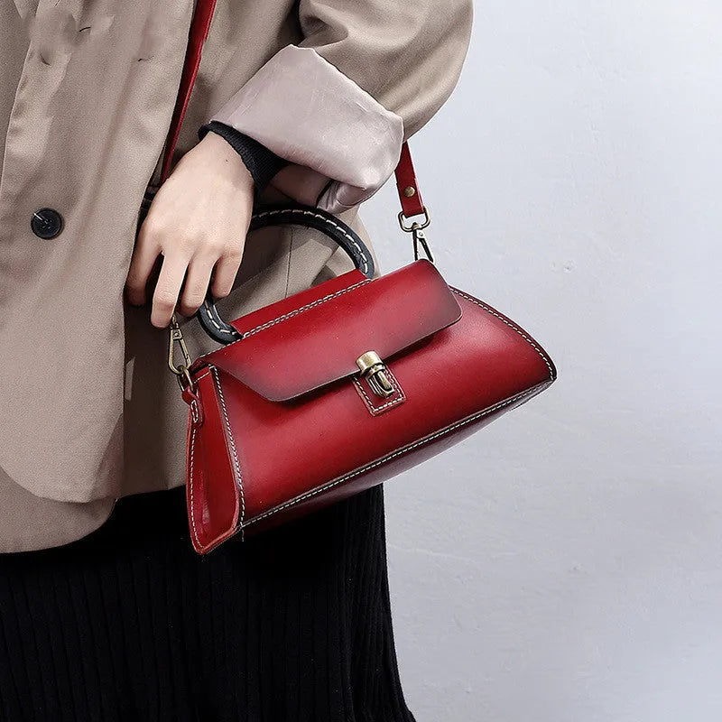 Women's genuine leather handbag with first layer cowhide, plain design, single strap, in yellow-brown, green or red.